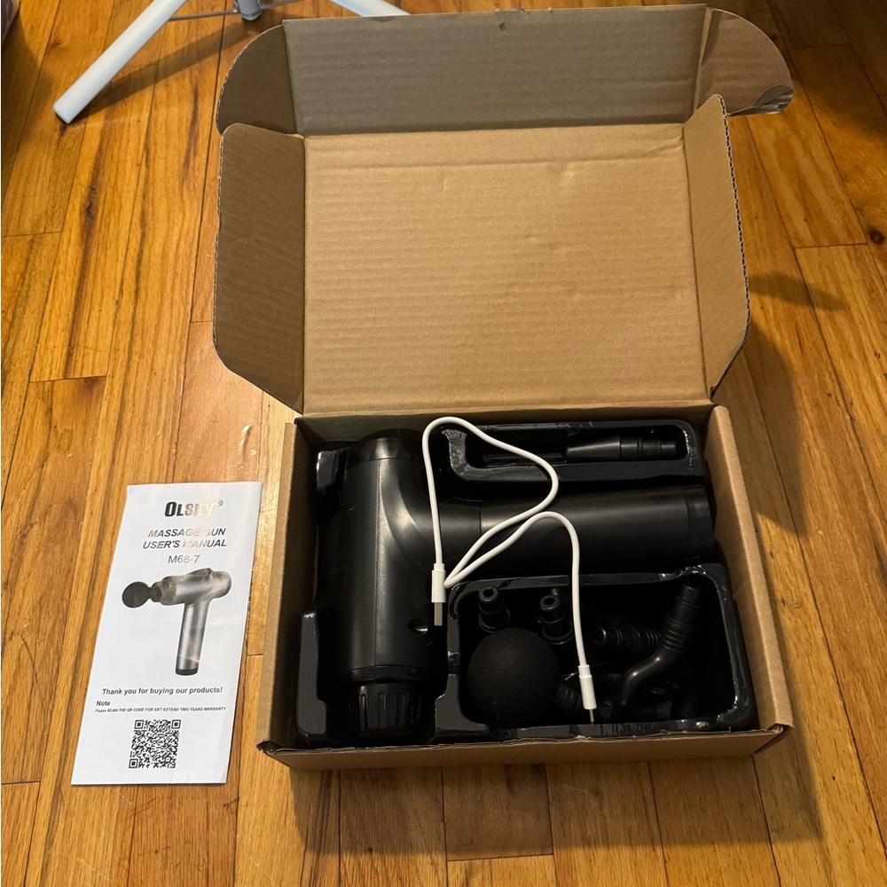 Black Percussion Massage Gun with Multiple Attachments - Black Theragun